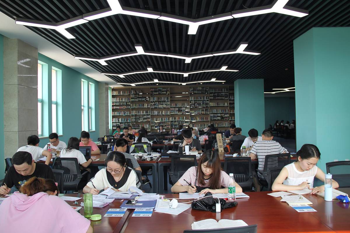 Students studying in a university library