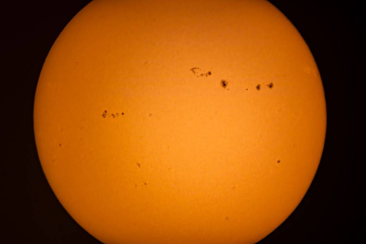 A high-resolution image capturing the Sun's surface with visible sunspots.